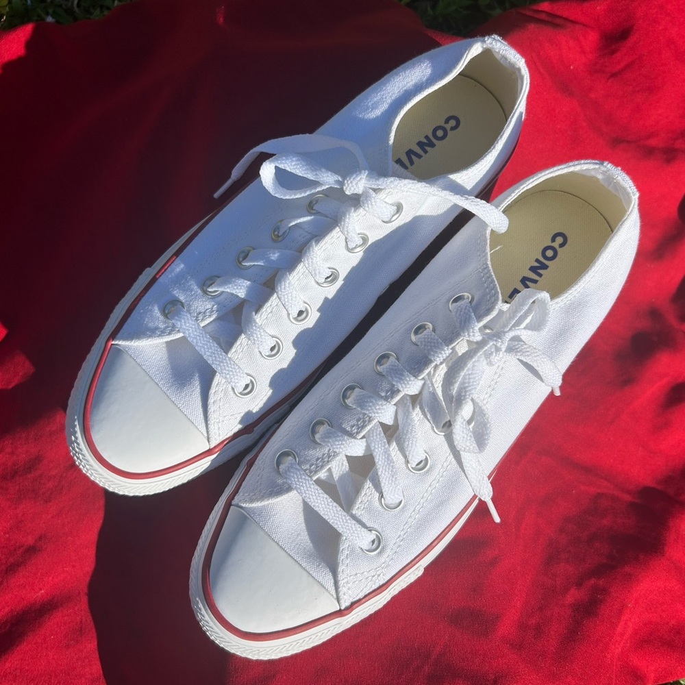 Classic White Sneakers with Red Stripe.